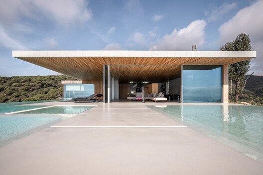 
        Building Lightness Through Glass and Frames
      