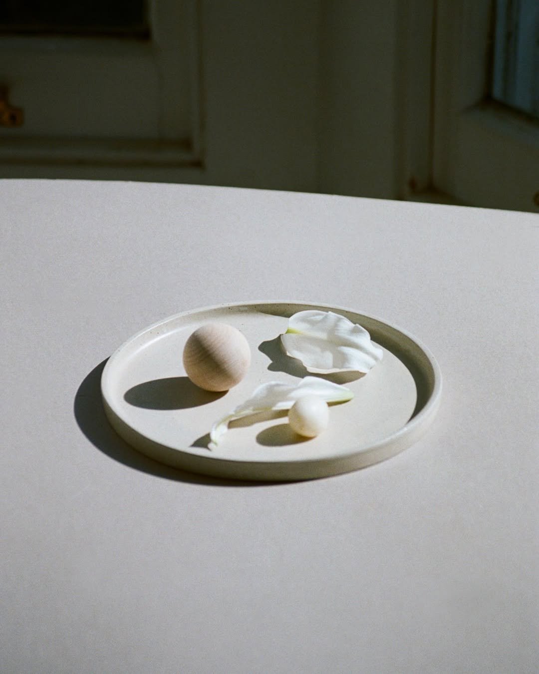 Lily petals, wooden ball, radish