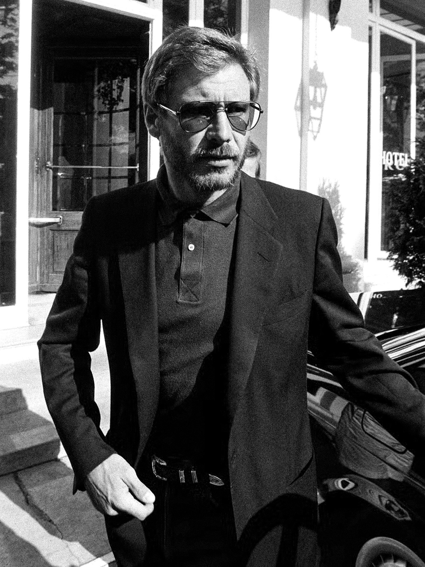 (1) Harrison Ford. A stealth style icon. Navy polo, dark blazer, jeans, loafers with no socks.