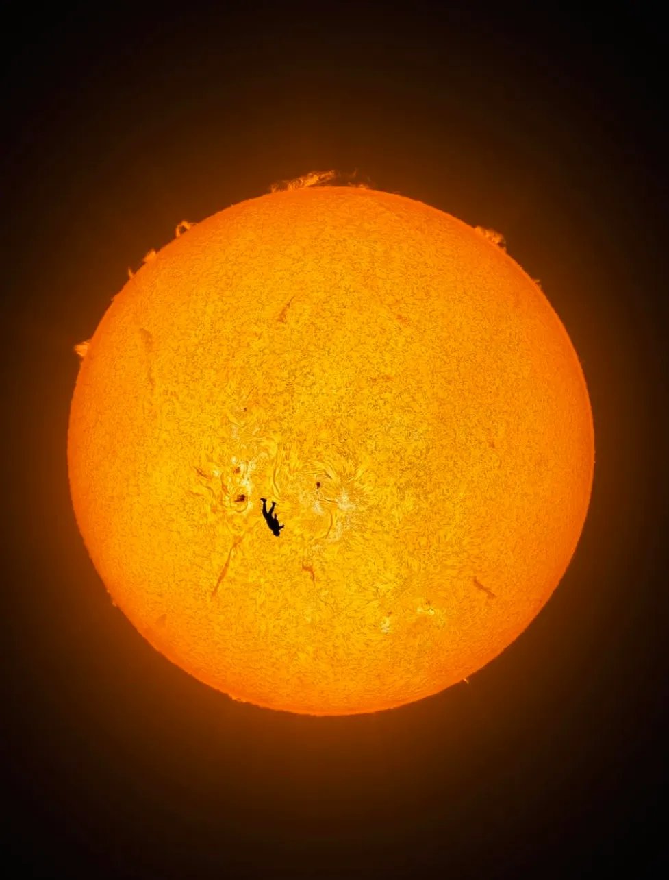 have you guys seen this once in a life time shot of a human crossing the sun by photographer Andrew McCarthy??? An almost impossible shot of a skydiver perfectly aligned with the blazing surface of the Sun✨