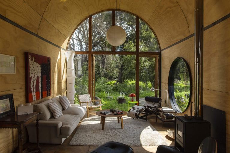 A Curved Tiny House That Captures The Landscape In Every Direction