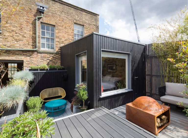 A Dark Timber Bedroom Extension Transforms This London Backyard