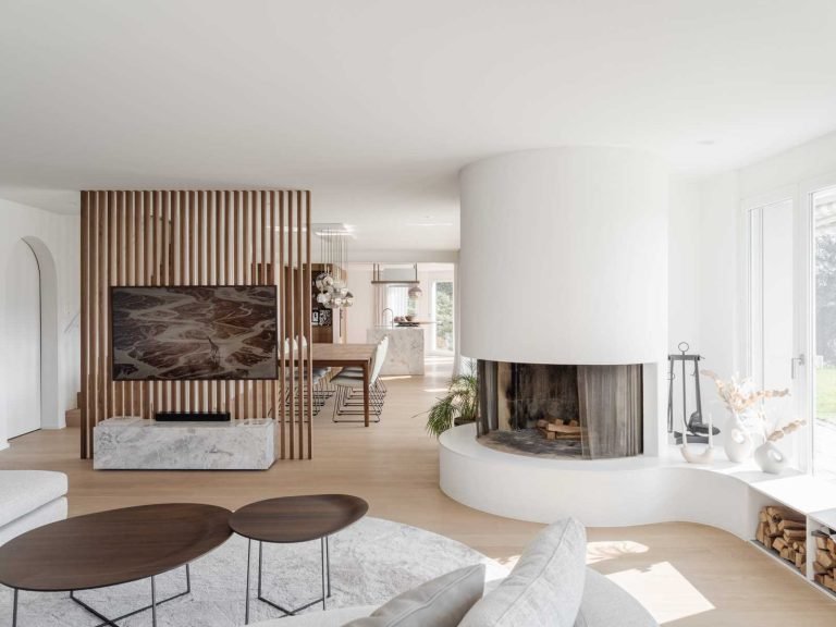 A Curved Fireplace and Wine Cellar Give This Swiss Home Its Character
