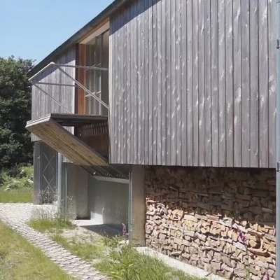 Unique Architectural Features: This Disappearing Balcony and Coronally-Rotating Window 