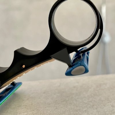 The Twinshaver: A Low-Tech, Fast, Safe, Ergonomic Head-Shaving Invention 