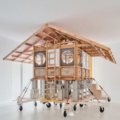 In an Industrial Space, a Freestanding Bedroom Structure as Home-Within-a-Home 