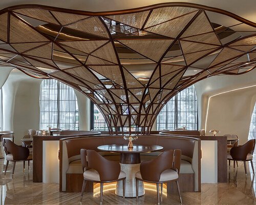 falwa restaurant transforms arabian equestrian heritage into fluid architectural interior