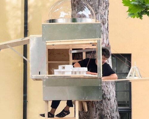 opposite office moves into one-square-meter treehouse at bauhaus university