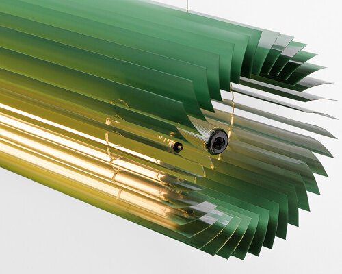 discarded aluminum blinds transform into cylindrical lighting system