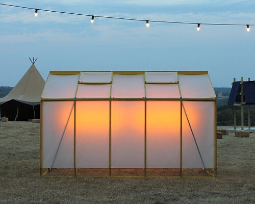 greenhouse converts into inhabitable light installation for music festival in the UK