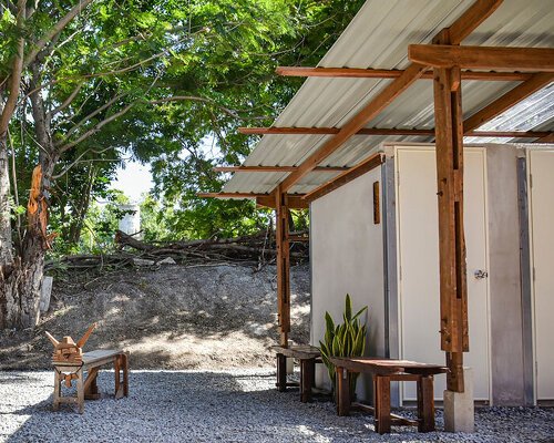 volunteer camp in thailand hand-builds school toilet from reclaimed wood