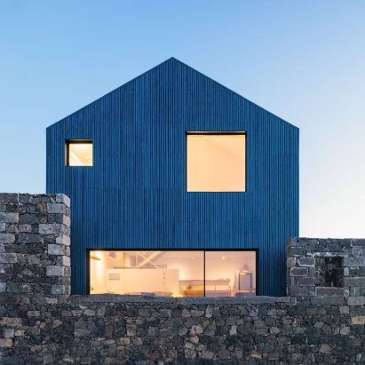 Atelier Backlar wraps Portuguese clifftop house in recycled ocean plastic