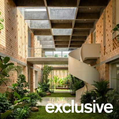 Perforated brickwork wraps courtyard home in India by Spacefiction Studio