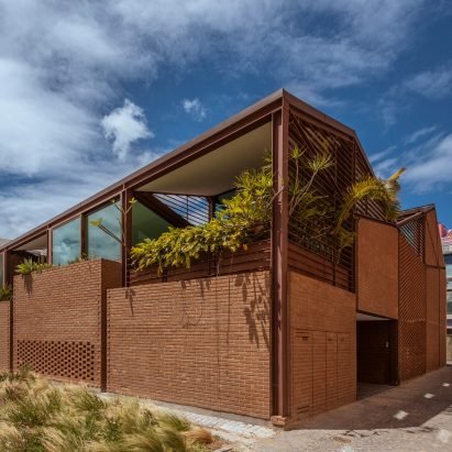 António Costa Lima Arquitectos completes warehouse-style housing block in Lisbon