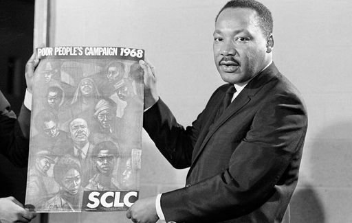 Martin Luther King holding poster