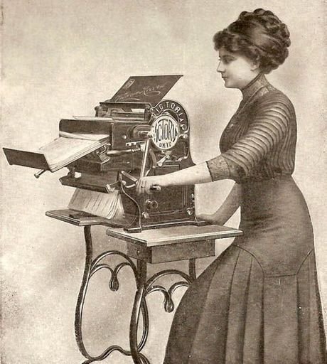 Woman operating a duplicator