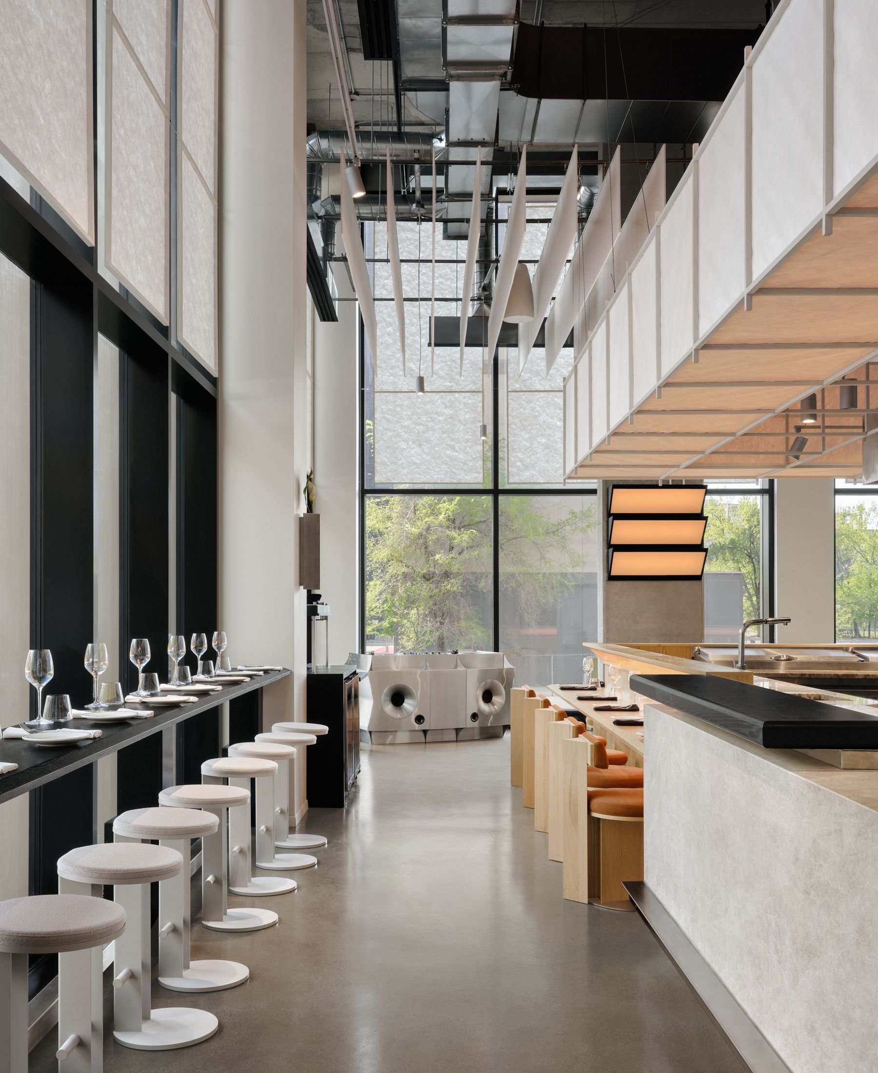 Ivy Studio Drops a Lesson in Japanese Restraint into a Raw Concrete Shell in Downtown Montreal.